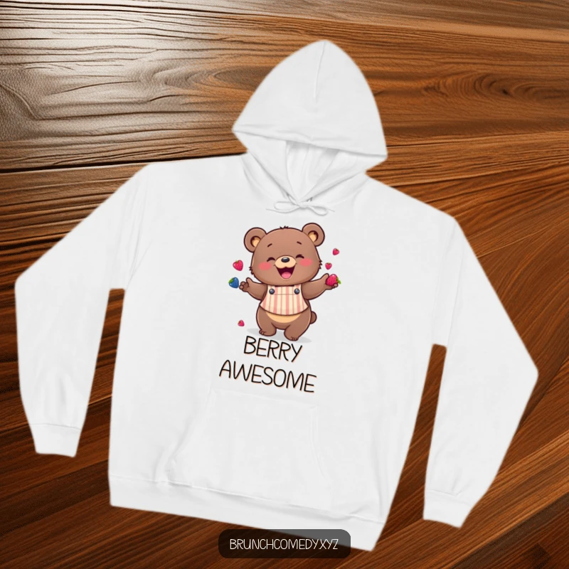 Funny bear juggling berries on a hoodie, making it a cozy kitchen statement piece.